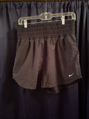 Women’s Nike DRI-FIT black running shorts, size Medium
